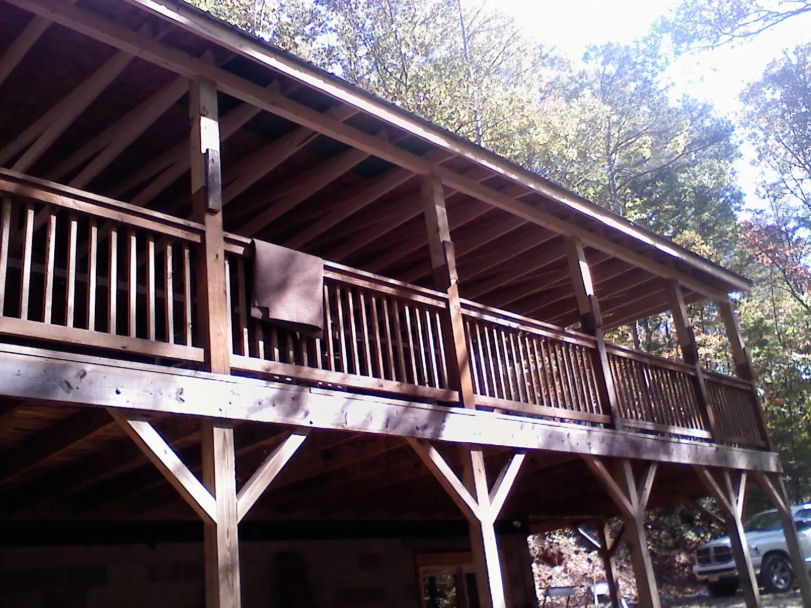 Timber framing under a new elevated porch and deck — Roof Leak Repair in Cedar Glen by Roofing Brothers